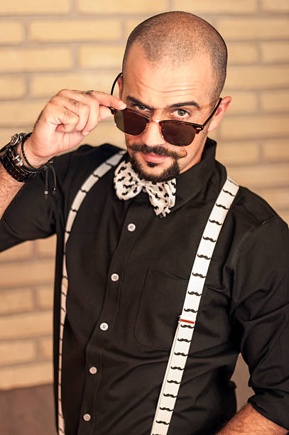 istock Young man looking at the camera over the glasses 477718292