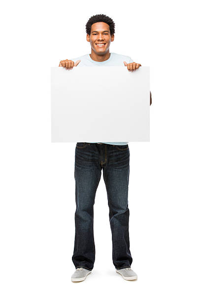 istock Young casual man holding up sign 477719425