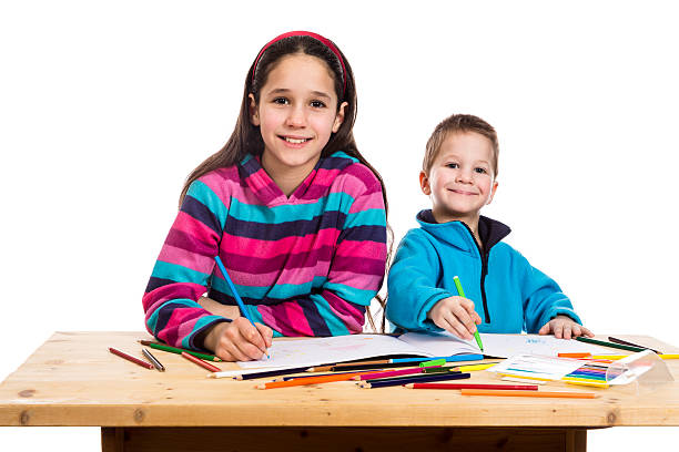istock two happy kids learn to draw together 477720960