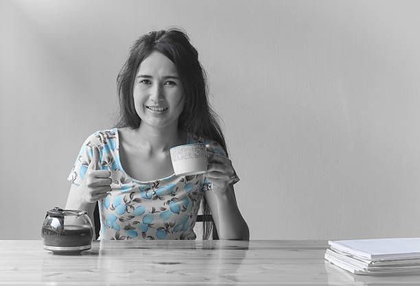 istock woman drink coffee 477721102
