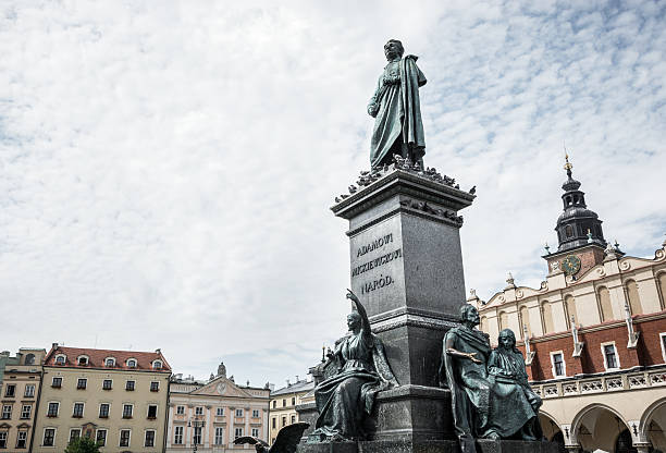 istock Adam Mickiewicz statue in Main Market Square at Krakow, Poland 477722431