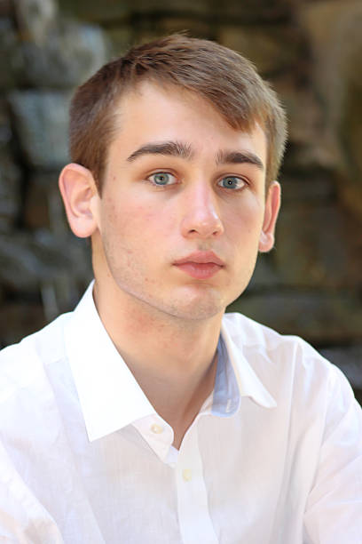 istock Teenager With Serious Look Poses For Camera 477722448