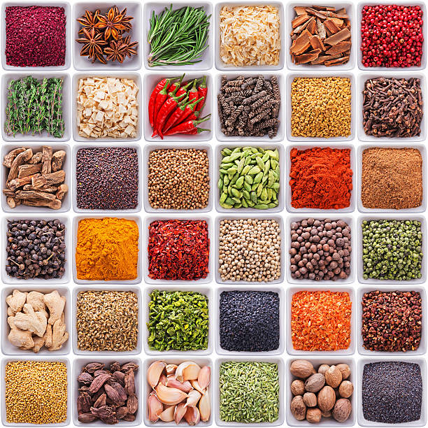 istock collection of different spices and herbs 477722623