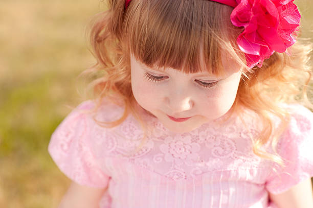 istock Cute kid girl outdoors 477722836