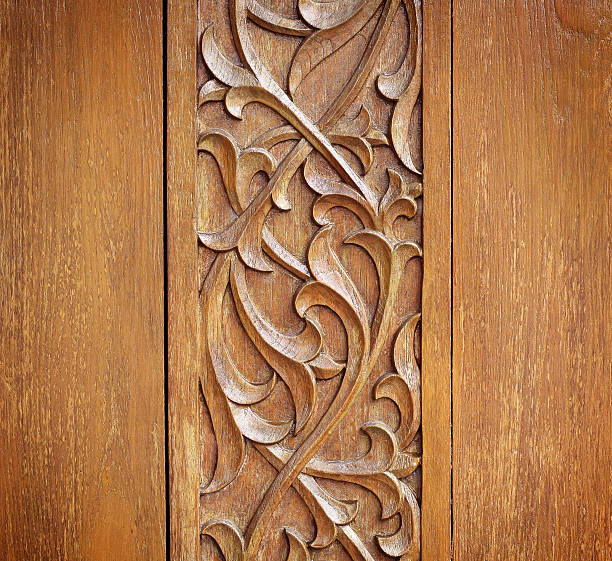 Pattern of wood frame carve flower on wood background