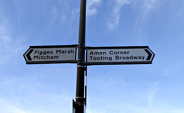 istock Road sign outside Tooting Junction railway station Amen Corner 477724783