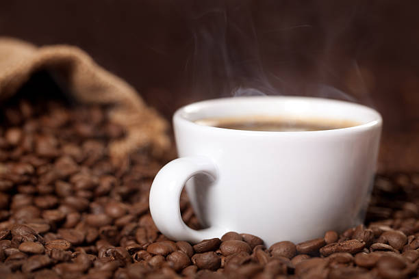 istock Cup of coffee with coffeebeans 477724853