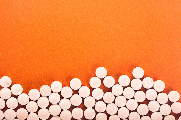 환약 - orange pill close up large group of objects 뉴스 사진 이미지