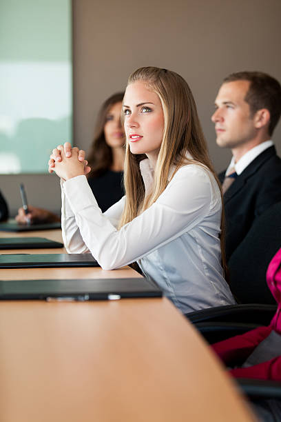 istock Business woman paying attention 477725473