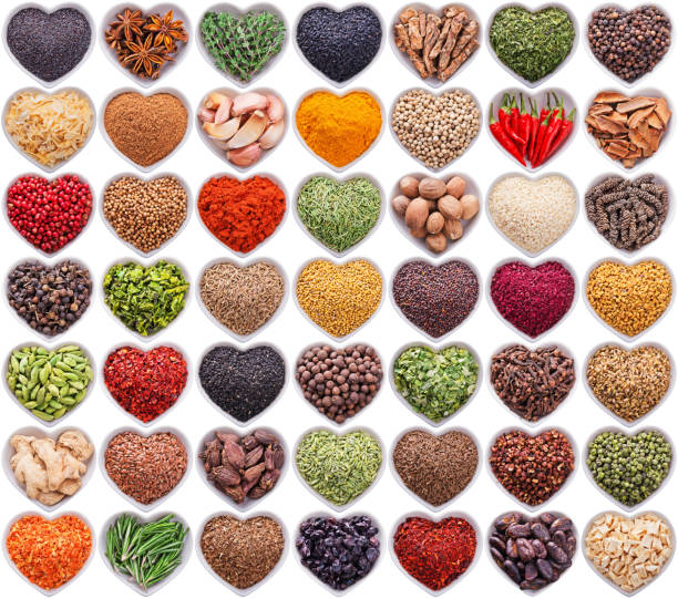 large collection of different spices and herbs isolated on white background