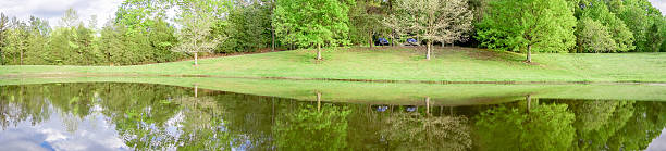 istock beautiful landscape and reflections in water 477726400