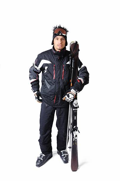 uno sciatore uomo in posa su sfondo bianco - snow gear foto e immagini stock