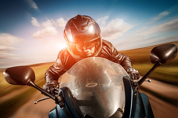 istock Biker racing on the road 477726861