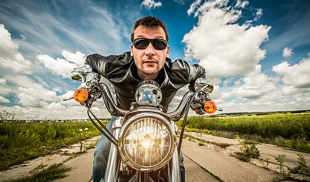istock Funny Biker racing on the road 477727349