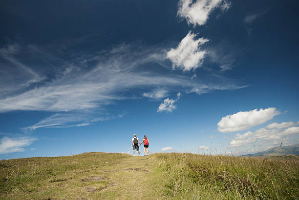 istock Hikers on the top of mountains 477728081