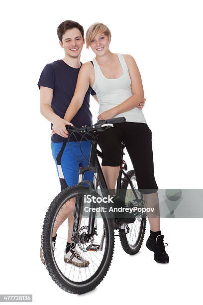 Fit Healthy Young Couple Stock Photo - Download Image Now - Bicycle, Couple - Relationship, Cycling