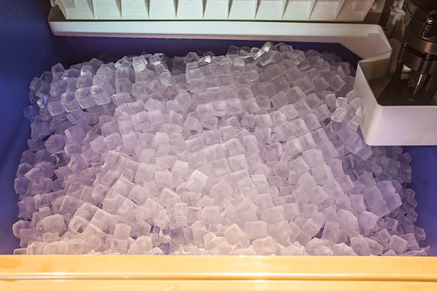 ice in the ice machine ice stacked in the ice machineice stacked in the ice machine ice machines stock pictures, royalty-free photos & images