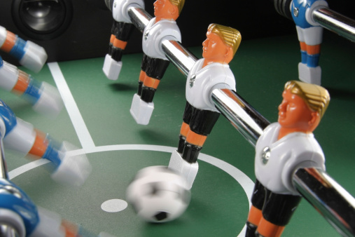 Start to play table soccer. Start to play table soccer.