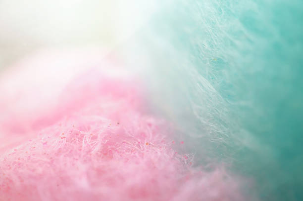 caramella di cotone colorato in colori tenui - school carnival food cotton candy foto e immagini stock