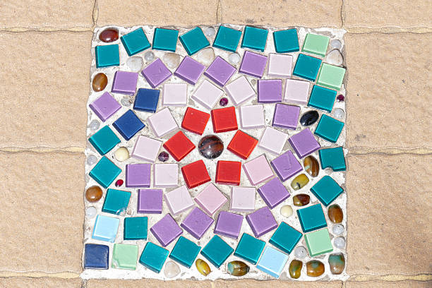 the art design of colorful stone and mosaic tile decorating on temple floor for abstract background