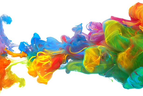 istock Clouds of bright colorful ink mixing in water 477731868