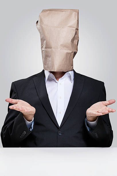 istock Man with paper bag on his head 477732403