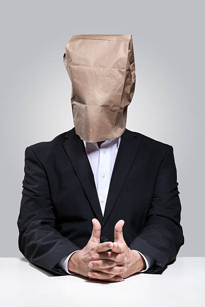 istock Man with paper bag on his head 477732441