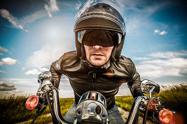 istock Biker racing on the road 477732783