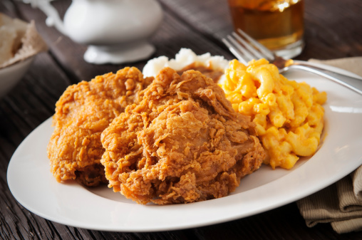 Fried chicken with macaroni and cheese, mashed potatoes with gravy and sweat tea.  Please see my portfolio for other food and drink images.