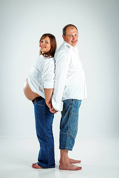 istock Happy couple expecting baby 477736009