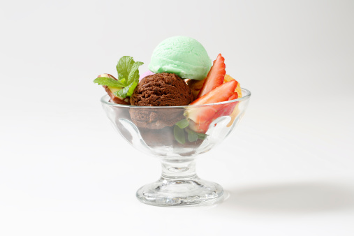 scoops of ice cream - assorted flavors in glass bowl