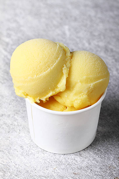 istock passion fruit sorbet in white cup 477737840