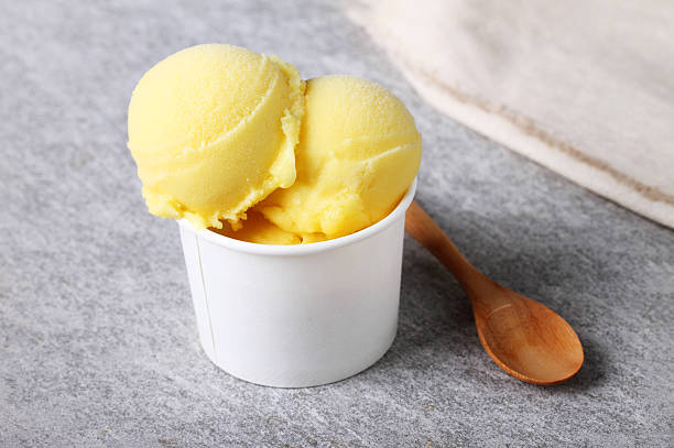 istock passion fruit sorbet in white cup 477737844