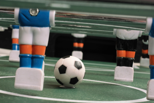 Start to play table soccer. Start to play table soccer.