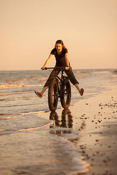 istock Young woman having a great time riding on the beach. 477739192