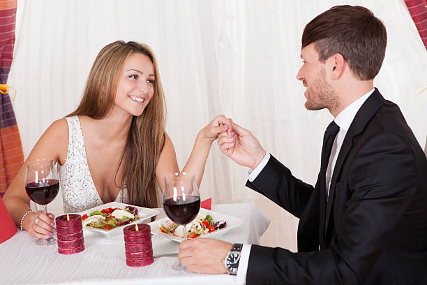 istock Loving couple enjoying a romantic meal 477743220