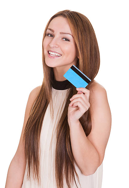 istock Young Woman Holding Credit Card 477743582