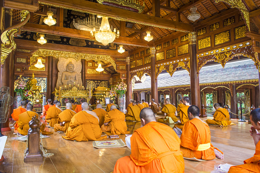 Chiangmai, Thailand - April 26, 2015:  - Monks Evening Chant in Wat Rampoeng temple.