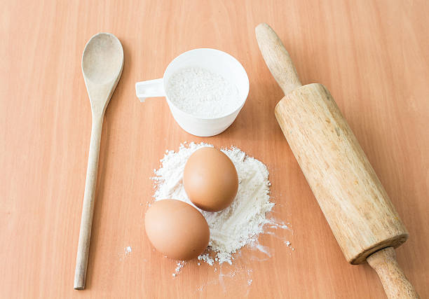 istock Ingredients for baking cake with egg on a wooden worktop 477746926