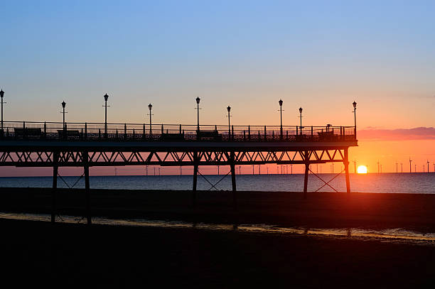istock Skegness pier at sunrise in June 477749834