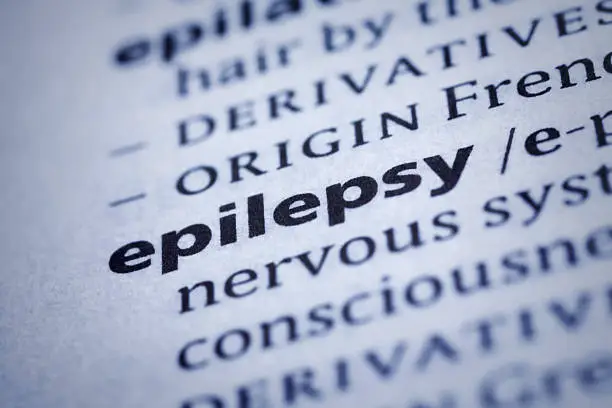 Epilepsy: Dictionary Close-up. Epilepsy is a group of neurological disorders characterized by epileptic seizures. Selective focus and Canon EOS 5D Mark II with MP-E 65mm macro lens.