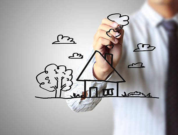 istock hand drawing house in a whiteboard 477751018
