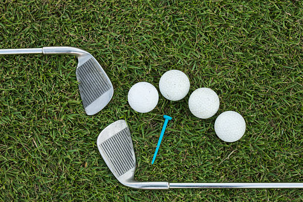istock Golf Ball and Golf Club on grass 477753416