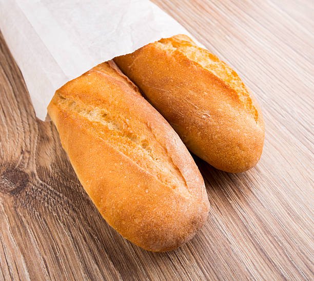 istock Baguette in paper bag 477753475