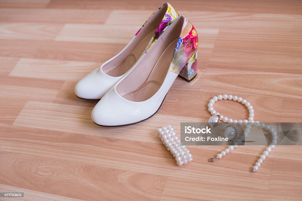 wedding shoes bracelet and earrings, a necklace wedding shoes bracelet and earrings, a necklace of pearls 2015 Stock Photo