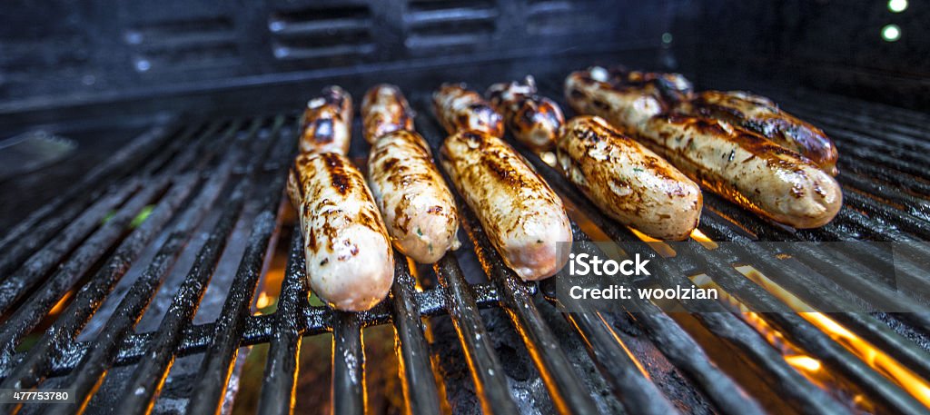 sausages on the BBQ pork barbecue meats sharing 2015 Stock Photo