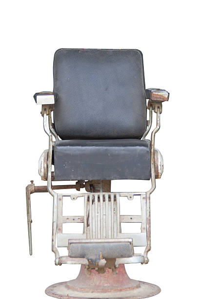 istock old barber chair on white background 477760500