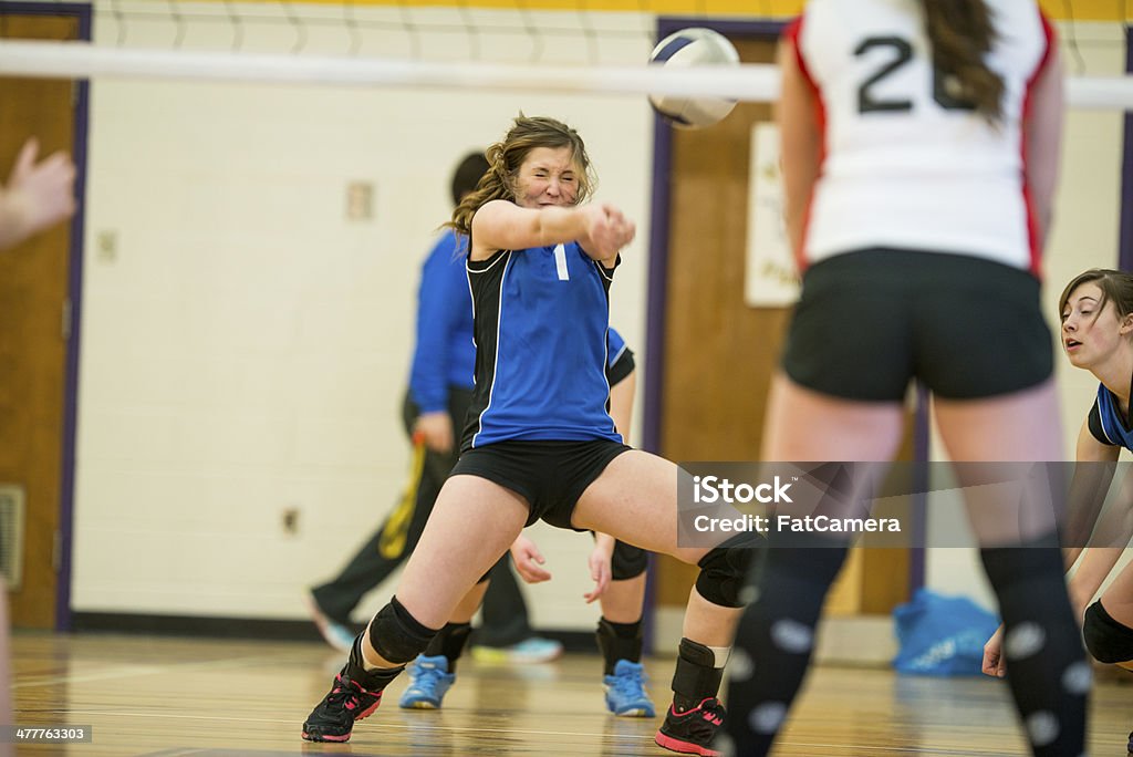 Varsity Volleyball Girls highschool volleyball game. 16-17 Years Stock Photo