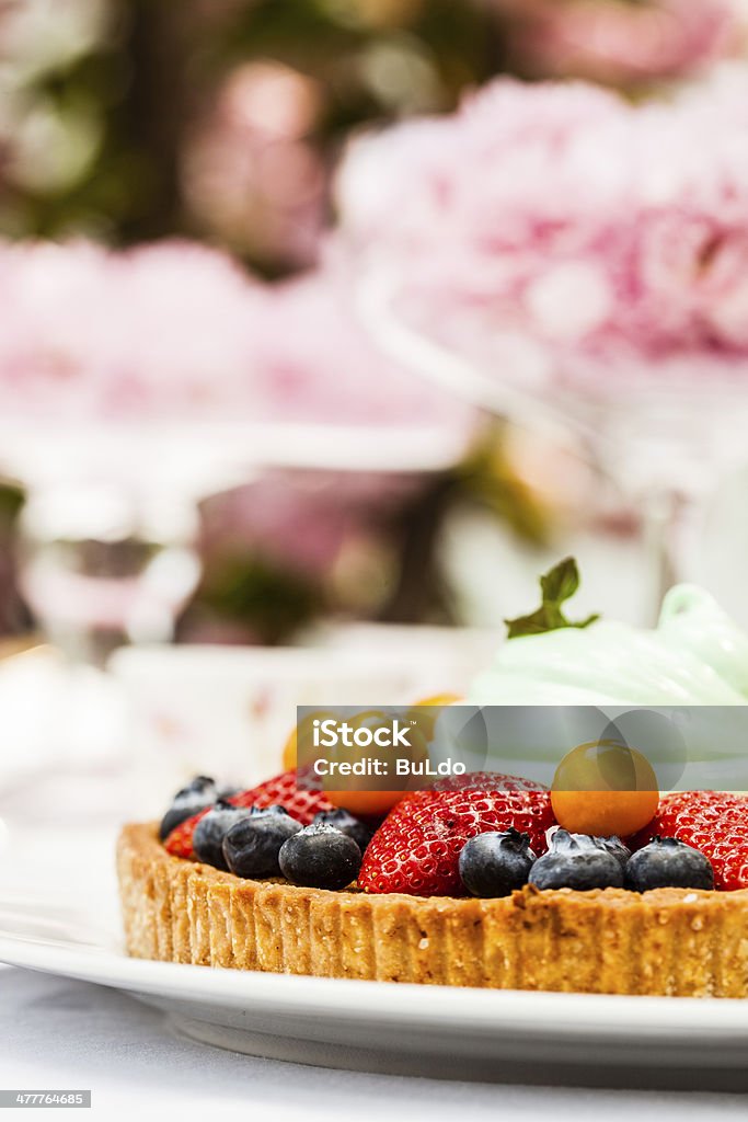 Dessert Dessert served outdoors with flowers and decoration Baked Stock Photo