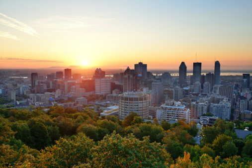 Montreal sunrise viewed from Mont Royal with city skyline in the morning